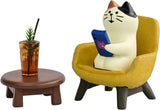 Cute cat figurine playing phone on sofa with coffee, cat lovers gift for home decor