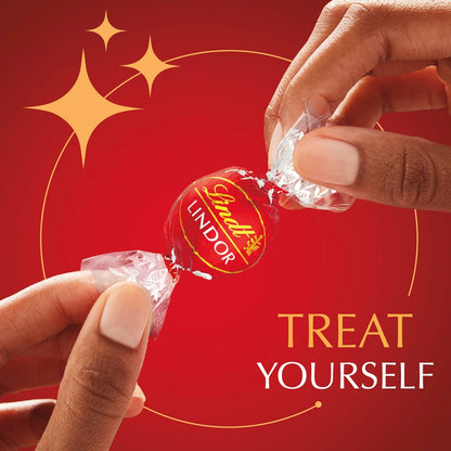 Lindt LINDOR Milk Chocolate Candy Truffles, Milk Chocolate with Melting Truffle Center, 15.2 oz. Bag