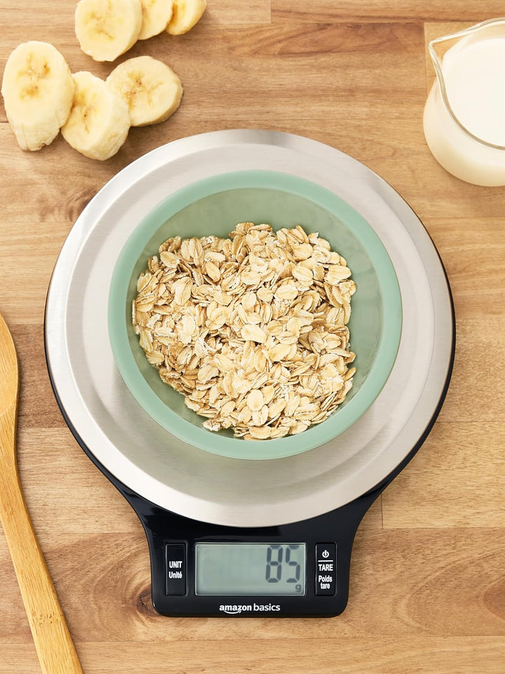 Amazon Basics Digital Kitchen Scale with LCD Display, Tare Function, Multiple Units, Weighs up to 11 Pounds, Batteries Included, Black and Stainless Steel